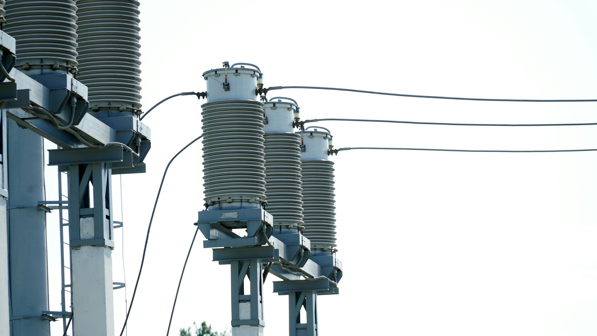 High and low voltage transformer bushings with electrical insulation and electrical equipment at a