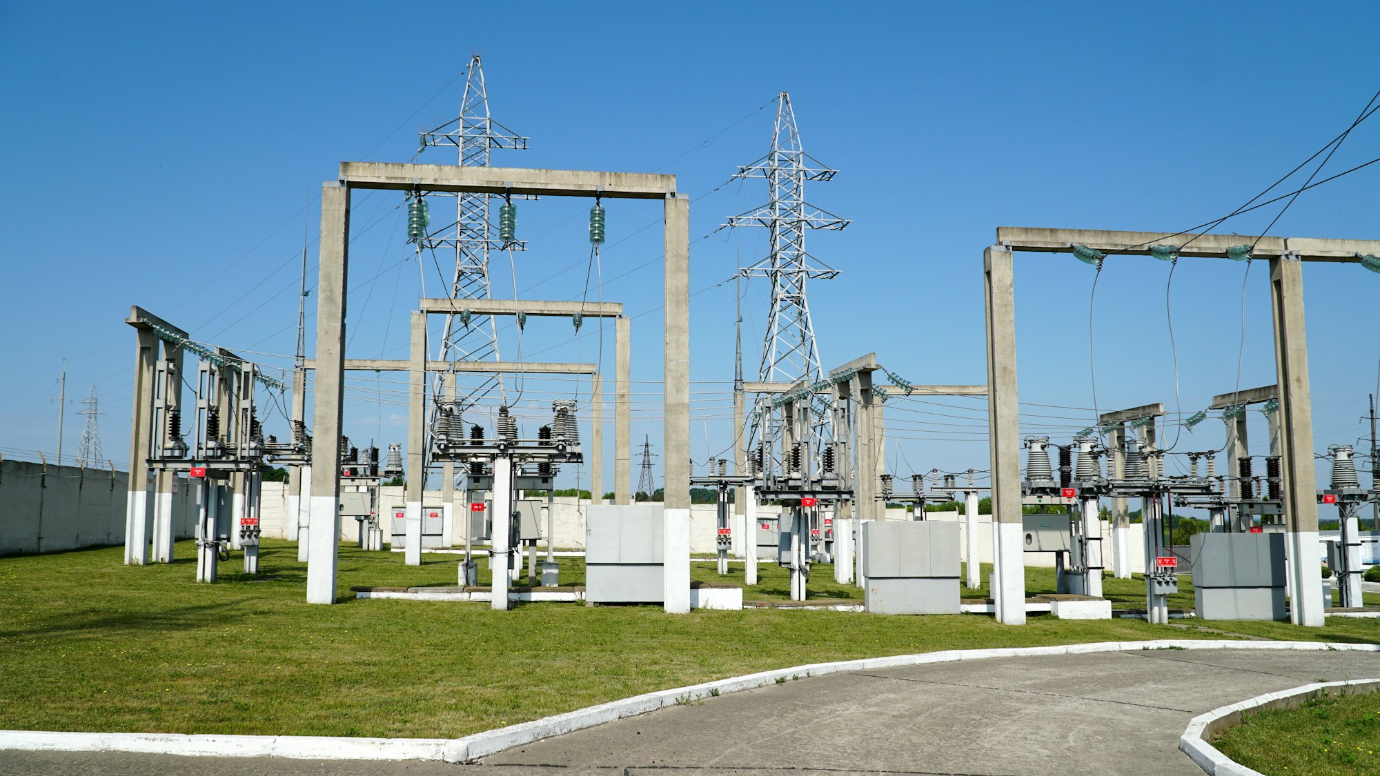 High and low voltage transformer bushings with electrical insulation and electrical equipment at a