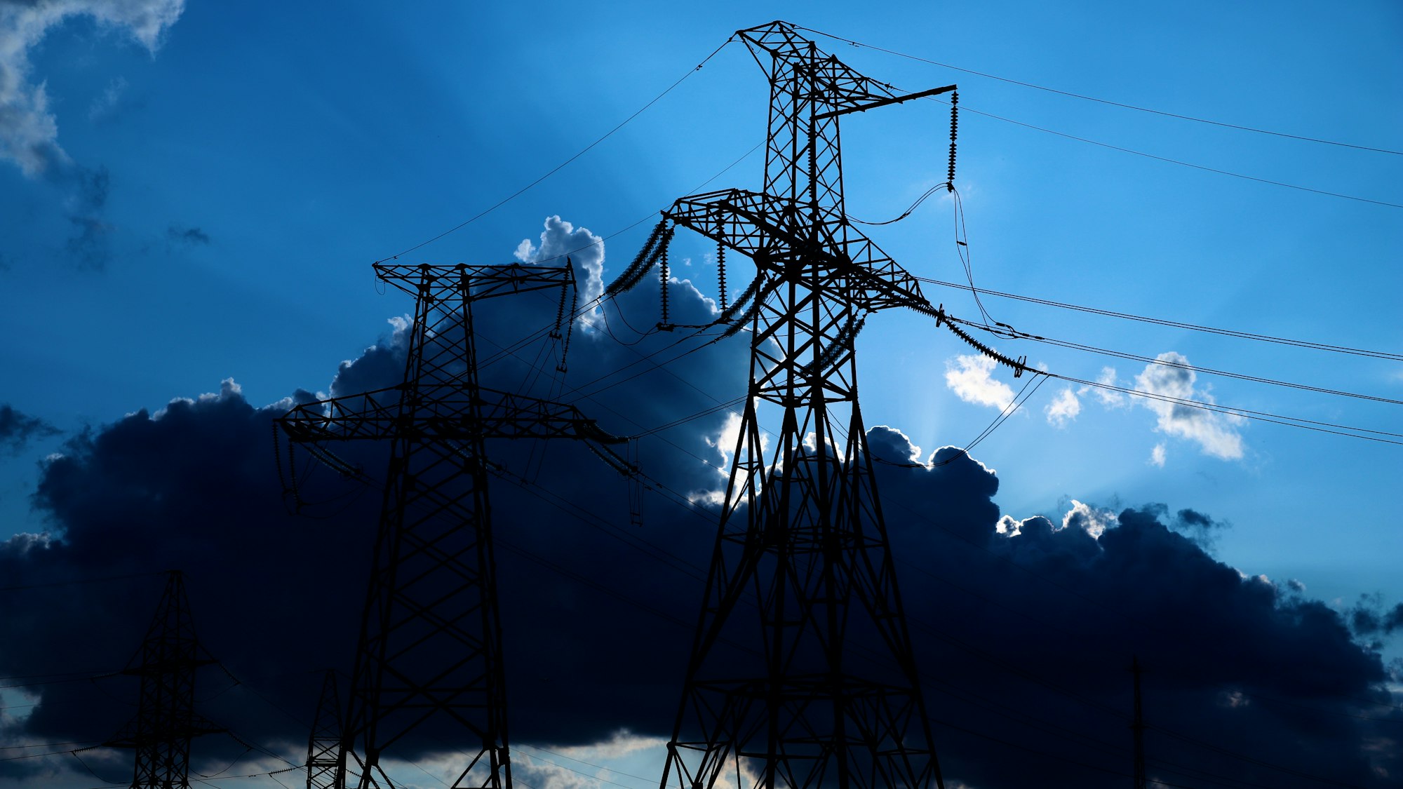 High voltage post. High voltage tower sky background.