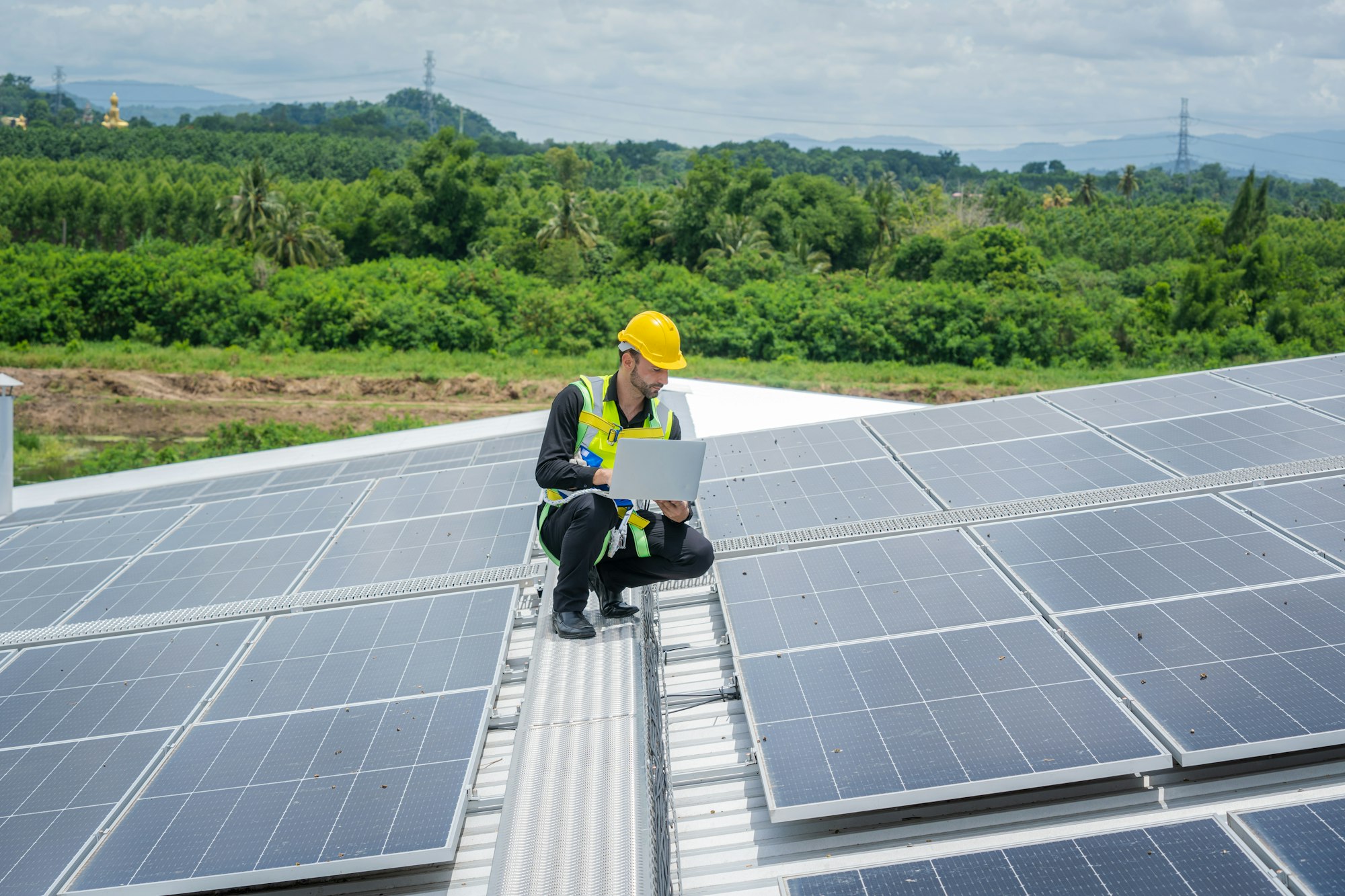 Technician checking Solar panel on top roof,Sun energy,Solar panel.