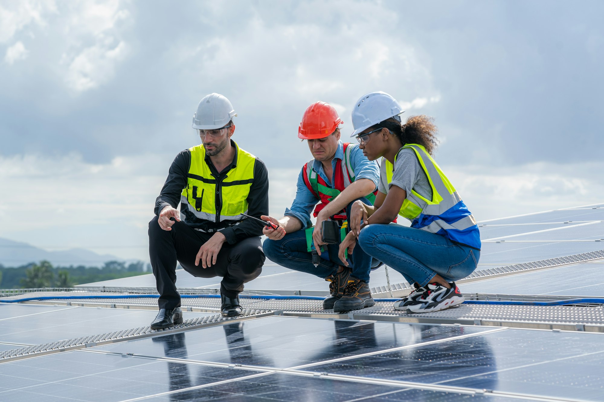 Solar panel energy,Electrical engineer man is working in solar station on roof.